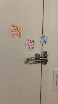 qr code stickers on a white door